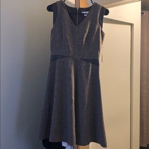 Brown flare dress with leather accents.